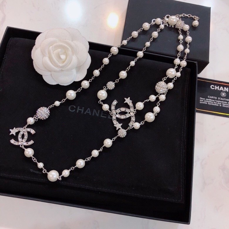 Ch*el brooches